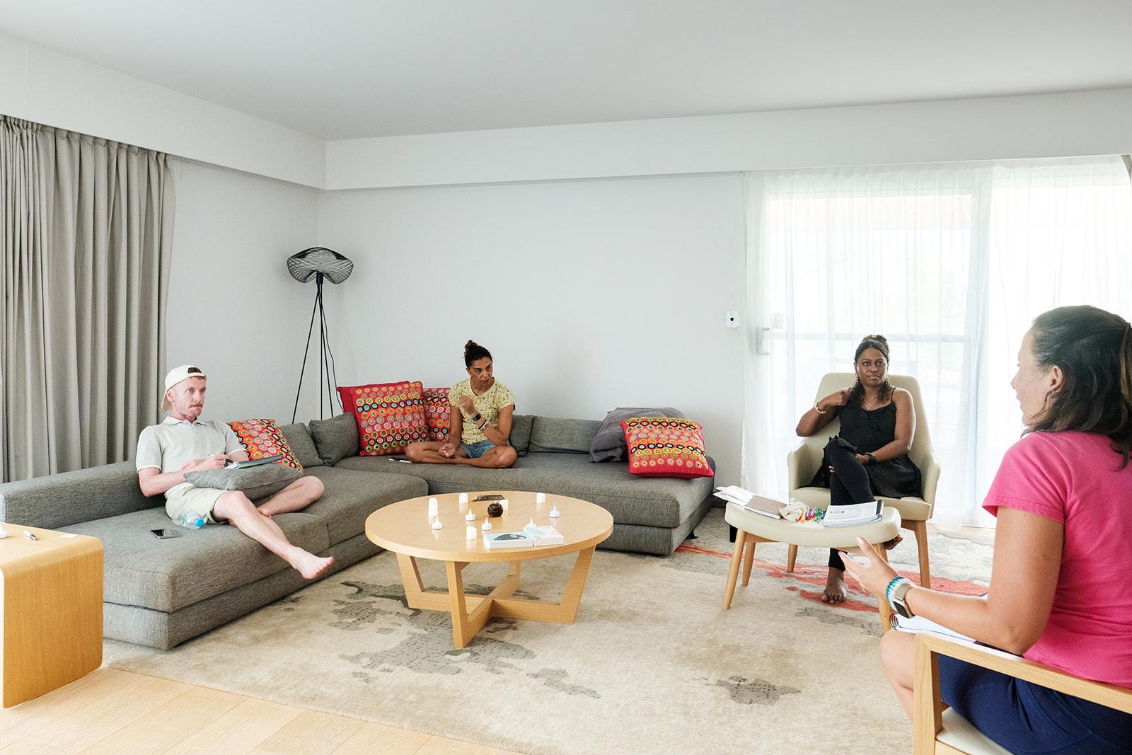 A coaching session underway in a lounge room